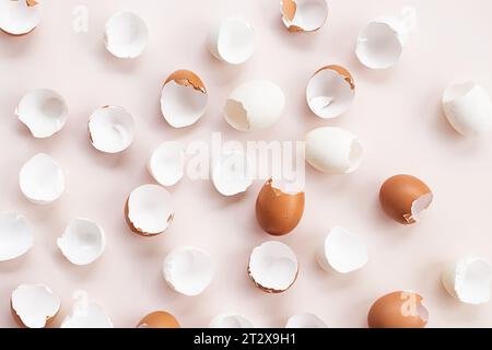 Springtime easter layout. Empty broken chicken eggshells. Stock Photo