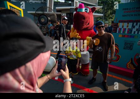 FIFA U-17 WOLRD CUP 2023 TROPHY EXPERIENCE People take pictures with the U-17 Football World Cup mascot during the FIFA U-17 World Cup 2023 Trophy Experience in Bandung, West Java, Indonesia, October 22, 2023. The event was held to welcome the U-17 World Cup Football to be held in Indonesia on 10 November, 2023. Credit: Imago/Alamy Live News Stock Photo