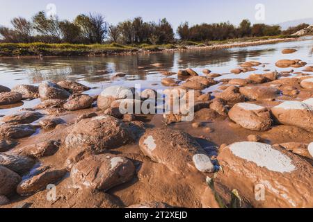 Background with river and stone shore Stock Photo