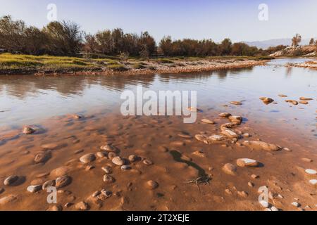 Background with river and stone shore Stock Photo