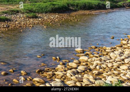 Background with river and stone shore Stock Photo