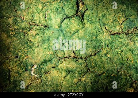 Background texture cracked clay wall with old grunge coating on the surface. Stock Photo
