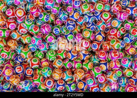 Lots of multi-colored lottery balls with numbers. Top view 3d rendering Stock Photo
