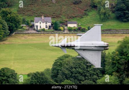 Royal Air Force Eurofighter (Typhoon) FGR4, flying low level at 250ft through the Lake District Low Flying Area (LFA17) Stock Photo