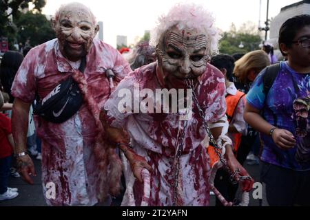 Non Exclusive: October 21, 2023, Mexico City, Mexico: Participants disguised as Zombies take part during the Annual Zombie Walk  at Mexico City's down Stock Photo