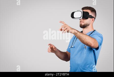 Doctor using VR headset, interacting with virtual interface Stock Photo