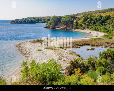 Shingle bar and lagoon on the north-east coast of Corfu in the Ionian Islands of Greece near Agio Stefanos Stock Photo