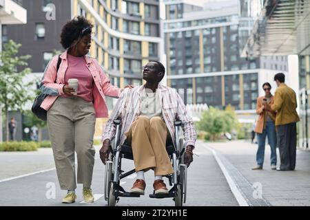 African American young couple walking together in the city Stock Photo
