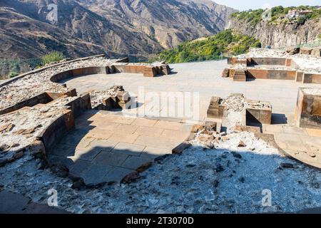 Garni, Armenia - September 30, 2023: ancient ruined royal buildings near Garni Temple in Gegham mountains in Armenia on sunny autumn day Stock Photo