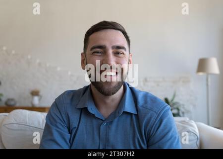 Cheerful handsome adult man home head shot portrait Stock Photo