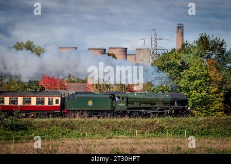 The Royal Scot heritage steam engine hauling the Pennine Moors Explorer rail tour on the West coast Main Line. Seen here at speed passing north. Stock Photo