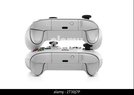 New york, USA - December 28, 2022: Next generation game consoles Microsoft  xbox and sony playstation with game pads isolated on white studio backgroun  Stock Photo - Alamy