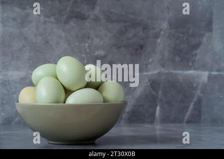 Close up colorful blue eggs on isolated background. Organic and Healthy farm food concept. Stock Photo