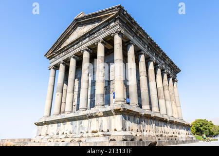 Garni, Armenia - September 30, 2023: view of ancient Greco-Roman Temple of Garni under blue sky on sunny autumn day. It is the only monument surviving Stock Photo