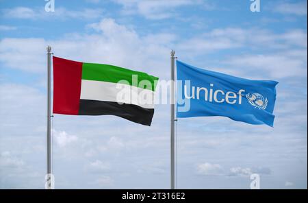 UNICEF and Brazil flags waving together in the wind on blue cloudy sky ...