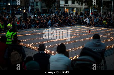 Stuttgart, Germany. 22nd Oct, 2023. Several thousand candles burn at a silent vigil organized by the aid organization STELP on Marienplatz in Stuttgart. The tea lights are meant to set a sign for all civilian victims of the Middle East conflict. Credit: Christoph Schmidt/dpa/Alamy Live News Stock Photo