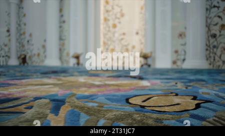 Close-up of beautiful modern carpet pattern. Scene. Beautiful carpet pattern on background of expensive interior of room. Carpet and wall patterns in Stock Photo