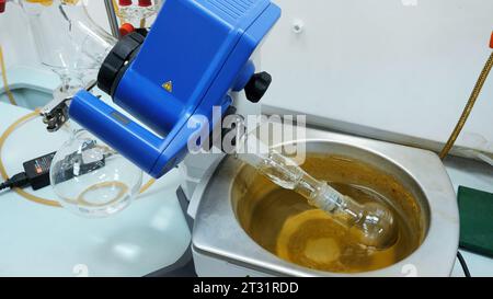 Work in the laboratory. Stock footage. A closed light space with various test tubes and chemical elements and scientists. Stock Photo