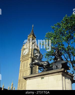 England. London. Big Ben with bronze statue of Boadicea and Her Daughters. Stock Photo