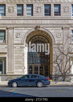 Downtown Trenton: Trenton Trust Company is a landmark commercial high-rise; the stone-clad building has a two-story arched entry on West State Street. Stock Photo