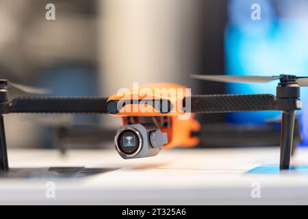 Drone and controller on display. Stock Photo
