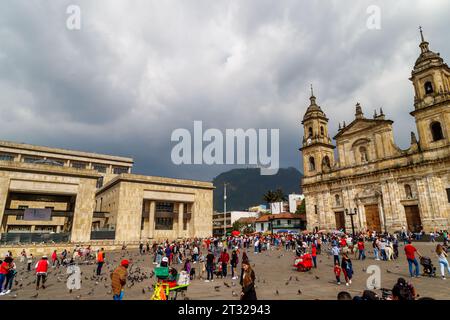 Bogota, Colombia - January 1, 2023: Some tourists gather in the Plaza de Bolivar, the main square of Bogota Stock Photo