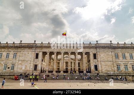 Bogota, Colombia - January 1, 2023: Some tourists gather in the Plaza de Bolivar, the main square of Bogota Stock Photo