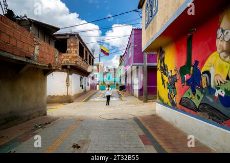 Bogota, Colombia - January 3, 2023: Woman walks through the El Mirador neighborhood in the suburbs of Bogota Stock Photo