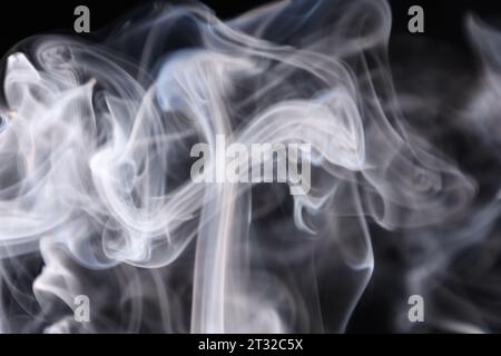 White silver smoke on a dark background, colourful abstract, white fog, minimalistic background, detailed smoke shapes Stock Photo