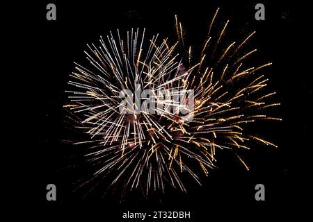 Fireworks expoling against the night sky Stock Photo