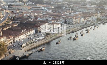 Portugal, Lisbon- July 29, 2022: Top view of port with yachts of ancient city in summer. Action. Beautiful coast of ancient European city with yachts Stock Photo