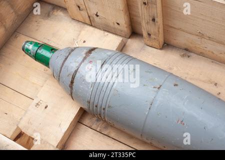 Soviet or russian 120 mm mortar round in army wooden crate. Stock Photo