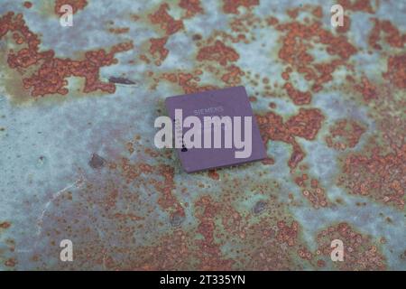 KYIV, UKRAINE - April 22, 2020. Siemens 286 processor unit on rusty metal background. Stock Photo