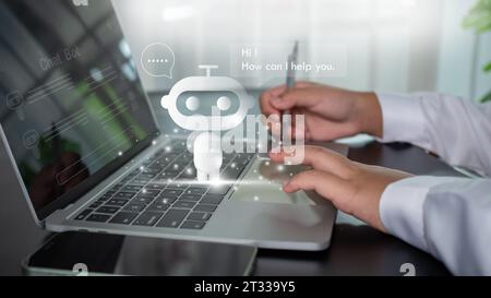 Businessman uses computer to type chat question and answer with artificial intelligence system or chatbot and represents artificial intelligence assis Stock Photo