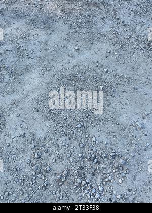 gravel and patchy ground sand and rock background texture Stock Photo