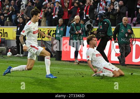 Cologne, Germany. 22nd Oct, 2023. Luca Waldschmidt (R) of FC Cologne celebrates after scoring during the first division of Bundesliga 8th round match between FC Cologne and Borussia Moenchengladbach, in Cologne, Germany, Oct. 22, 2023. Credit: Ulrich Hufnagel/Xinhua/Alamy Live News Stock Photo