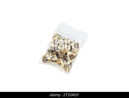 Moringa seeds in plastic package isolated on a white background Stock Photo