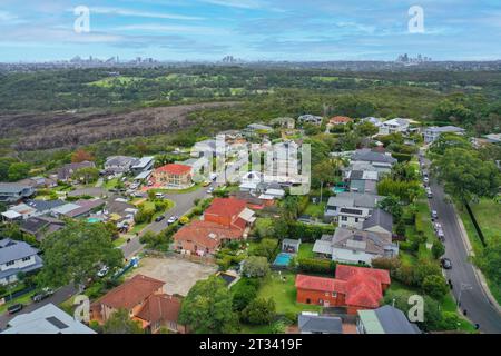 Panoramic drone aerial view over suburbs of Northern Beaches Sydney with CBD, North Sydney and Chatswood in the background. Stock Photo