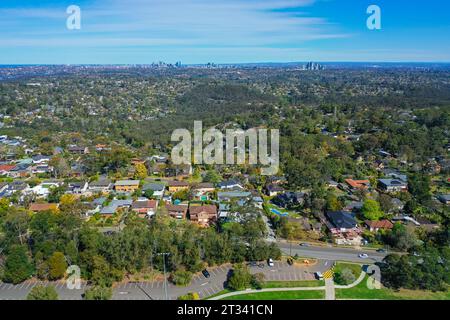 Panoramic drone aerial photo of a residential area in the Northern Beaches, with city in the distance, Sydney, Australia. Stock Photo