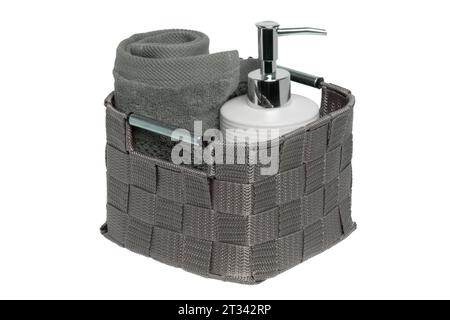 Bottle of shower gel and wicker basket with shells on sink in bathroom  Stock Photo - Alamy