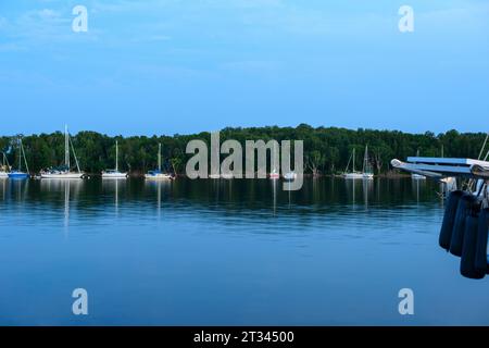 Boats on a lake in the evening Stock Photo