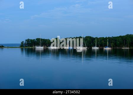 Boats on a lake in the evening Stock Photo