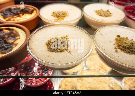 Gullac ( Turkish, Güllaç)is a Turkish dessert made with milk, rose water that is consumed especially during Ramadan. Stock Photo