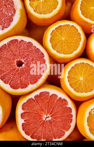 Fresh oranges and grapefruits background. Healthy and tasty food Stock Photo