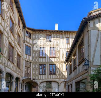 Distinctive, half-timbered, terraced houses on Coeur du Temple, in Limoges, in the Nouvelle-Aquitaine region of France. Stock Photo