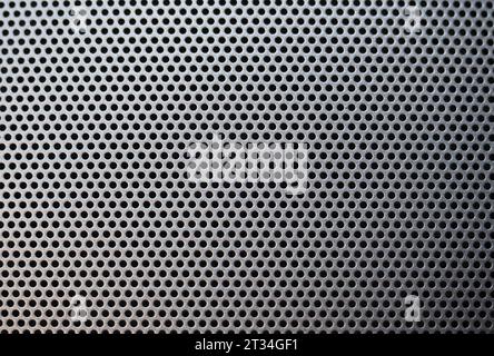 grey steel mesh metal texture useful as a background Stock Photo
