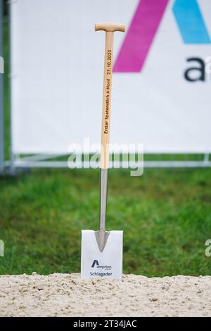 Meppen, Germany. 23rd Oct, 2023. A spade is stuck in a pile of sand before the official groundbreaking ceremony with, among others, Federal Economics Minister Habeck (Greens) for the construction of the A-North underground cable route. The new, 300-km-long route will transport two gigawatts of wind power from Emden in East Frisia to Meerbusch-Osterath in North Rhine-Westphalia. It can meet the energy needs of around two million people. Credit: Friso Gentsch/dpa/Alamy Live News Stock Photo