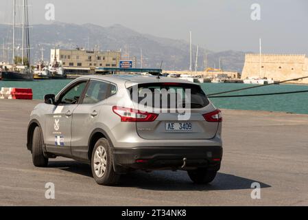 Port of Heraklion, Crete, Greece. 01.10.2023.  Greek  official transport, a grey coloured car of the Hellenic coast guard service on patrol in port. Stock Photo