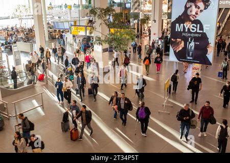 Amsterdam, The Netherlands - October 22, 2023: People at the Amsterdam Schiphol airport. Stock Photo