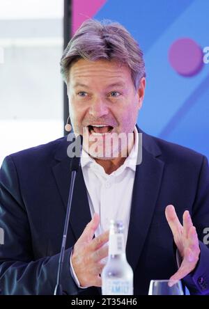 Meppen, Germany. 23rd Oct, 2023. Federal Economics Minister Robert Habeck (Greens) speaks before the official groundbreaking ceremony for the construction of the A-North underground cable route. In the future, the new 300-km-long route will transport two gigawatts of wind power from Emden in East Frisia to Meerbusch-Osterath in North Rhine-Westphalia. It can meet the energy needs of around two million people. Credit: Friso Gentsch/dpa/Alamy Live News Stock Photo